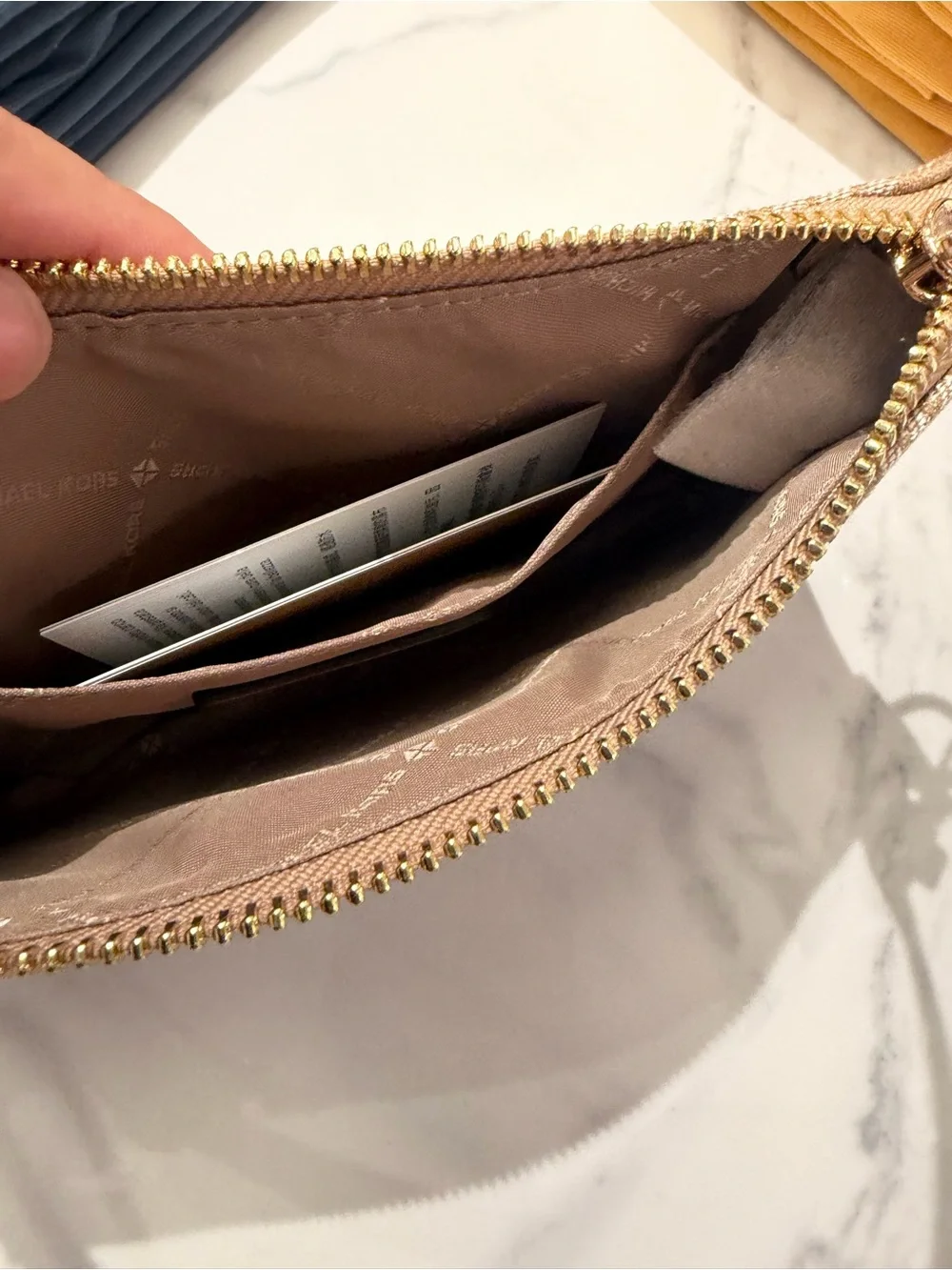 Michael Kors Signature Wristlet Clutch signature logo pink / brown/green